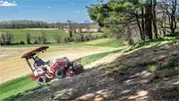 EA600 Aera-Vator The Ventrac effortlessly operates on slopes with the Aera-Vator attachment, seeding damaged areas of the lawn for revitalization.