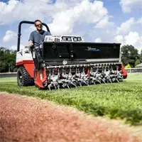 EA600 Aera-Vator Coreless aeration of a baseball field with the Ventrac Aera-Vator, an essential addition to municipal mowers and school mowing. Lawn aerator equipment.