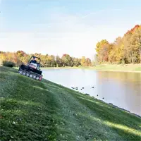 EA600 Aera-Vator The Ventrac Aera-Vator penetrates soil for fall overseeding without leaving cores, while the tractor’s stability ensures smooth operation even on steep slopes near water.