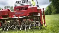 Ventrac Aerator 4520 Ventrac Aerating a lawn