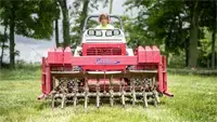 Ventrac Aerator 4520 Ventrac Aerating a lawn