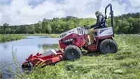 HQ682 Tough Cut Cut and remove overgrown vegetation along pond edges, improving waterway aesthetics and accessibility.