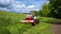 HQ682 Tough Cut Reclaim overgrown trails and paths, restoring accessibility for recreational use.