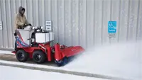 The Sidewalk Snow Vehicle is sized for sidewalks