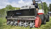 Reseed while aerating