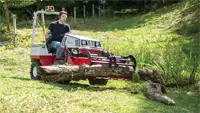 Power Bucket with optional Grapple Move brush and larger materials such as logs with the optional grapple