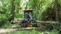 HE200 Power Grapple Pair the Power Grapple on the rear with the Brush Cutter up front to clear trails and move downed trees without ever switching attachments.