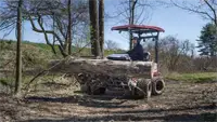 HE200 Power Grapple Contractors benefit from the second-auxiliary hydraulics that let the HE200 open, curl, and dump heavy loads without leaving the driver’s seat.