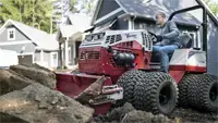 HE482 Power Bucket Move heavy rocks, logs, or other large materials efficiently with the Power Bucket’s durable steel construction and full hydraulic lift.