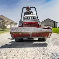HE482 Power Bucket Spread gravel across long driveways quickly and accurately using the Power Bucket’s 48-inch width and precise hydraulic dump control.