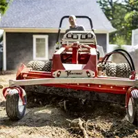 KG540 Power Rake Push and redistribute soil, gravel, or loose debris efficiently with the drum’s reversible rotation and adjustable wings.