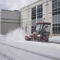 KJ Broom Operators stay efficient in winter storms by hydraulically angling the broom to direct snow exactly where it needs to go.