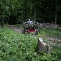 KM100 Rock Bucket w/ Grapple Clear trails with confidence — the Rock Bucket with Grapple grips uneven debris, brush, and rocks, making it a must-have for land management contractors.