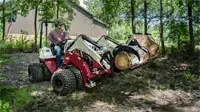 KM100 Rock Bucket w/ Grapple Tackle log clearing jobs efficiently with the Rock Bucket with Grapple, built to securely clamp down on heavy, irregular loads.