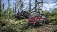 KM100 Rock Bucket w/ Grapple Built for rugged conditions, the Rock Bucket with Grapple is ideal for debris cleanup in wooded areas, construction sites, and municipal projects.
