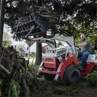 KM100 Rock Bucket w/ Grapple Clean up storm debris fast — the Rock Bucket with Grapple grabs limbs, branches, and tangled piles in one pass.