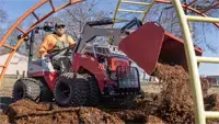 KM660 Light Material Bucket The Light Material Bucket pairs with Ventrac’s compact tractor frame, making it easy to spread mulch under jungle gyms and in tight playground spaces where larger equipment can’t reach.