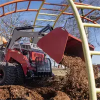 KM660 Light Material Bucket The Light Material Bucket pairs with Ventrac’s compact tractor frame, making it easy to spread mulch under jungle gyms and in tight playground spaces where larger equipment can’t reach.