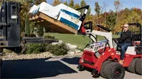 KM410 Pallet Forks Gain 50-inch fork clearance when fully raised, enabling operators to lift pallets over obstacles and dump into high trailers with precision.