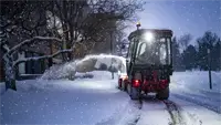 KX Snowblower Standard features like adjustable cast-iron skid shoes, hardened steel side shoes, and a reversible high-carbon steel cutting edge ensure durability in harsh snow conditions.