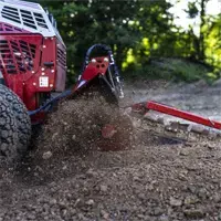 KY400 Trencher The KY400 Trencher’s side auger efficiently moves loose soil away from the trench, keeping your cut clean and clear for fast backfilling.