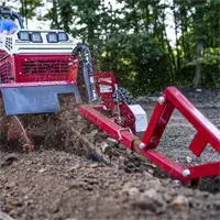 KY400 Trencher The integrated side auger on the KY400 Trencher keeps trenches clean by moving soil out of the cut path, reducing cleanup time and increasing productivity.