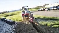 KY400 Trencher Designed for precision, the KY400 Trencher can operate smoothly along fences, buildings, and landscaping features, giving contractors the control they need in tight spaces.
