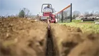 KY400 Trencher The KY400’s 40-inch trenching depth is perfect for deep installations like utility conduits, perimeter drains, or landscape drainage systems.