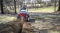 KY400 Trencher The KY400 Trencher makes clean drainage trenching simple — up to 40-inch depth with a 5½-inch wide cut, ideal for installing downspouts or French drain systems.