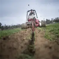 KY400 Trencher Landscape contractors benefit from the KY400 Trencher’s cutting width of 5½-inches, allowing them to install cable or irrigation lines without causing excessive turf damage.
