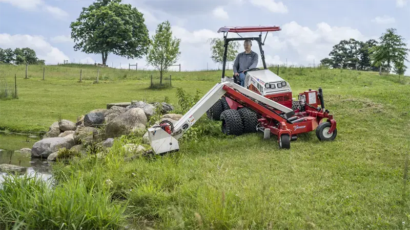 With a 115-inch horizontal reach, the MA900 Boom Mower enables operators to access and maintain hard-to-reach areas, such as steep embankments and narrow pathways, reducing the need for manual labor.