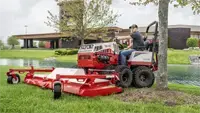 MK960 Wide Area Mower Maneuver easily around trees and obstacles using the MK960 Wide Area Mower, which features offset caster wheels that allow precise trimming close to edges.
