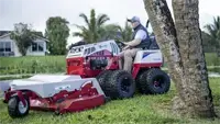 Maneuver around trees and obstacles with ease, thanks to the Ventrac Finish Mower's design and floating deck.