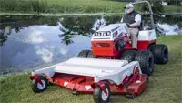 Achieve a manicured look along water features; the Ventrac Finish Mower's design prevents clumping and ensures a clean edge.
