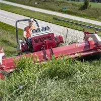Mowing steep slopes with the MWMY Flail Mower shows off its ability to stay stable while cutting dense, tall grass.