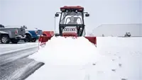 SP720 Box Plow Clearing deep snow from a parking lot: the SP720 Box Plow’s wings capture and move large volumes with fewer passes.