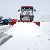 SP720 Box Plow Clearing deep snow from a parking lot: the SP720 Box Plow’s wings capture and move large volumes with fewer passes.