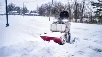 NE380 Snow Bucket Clearing access to a driveway becomes much faster when using the NE380 Snow Bucket to scoop, lift, and carry heavy snow piles out of the way with hydraulic precision.