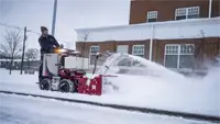 NX340 Snowblower This two-stage snow blower attachment removes snow in front of business entrances and walkways with ease, ensuring fast and reliable snow management for commercial properties.