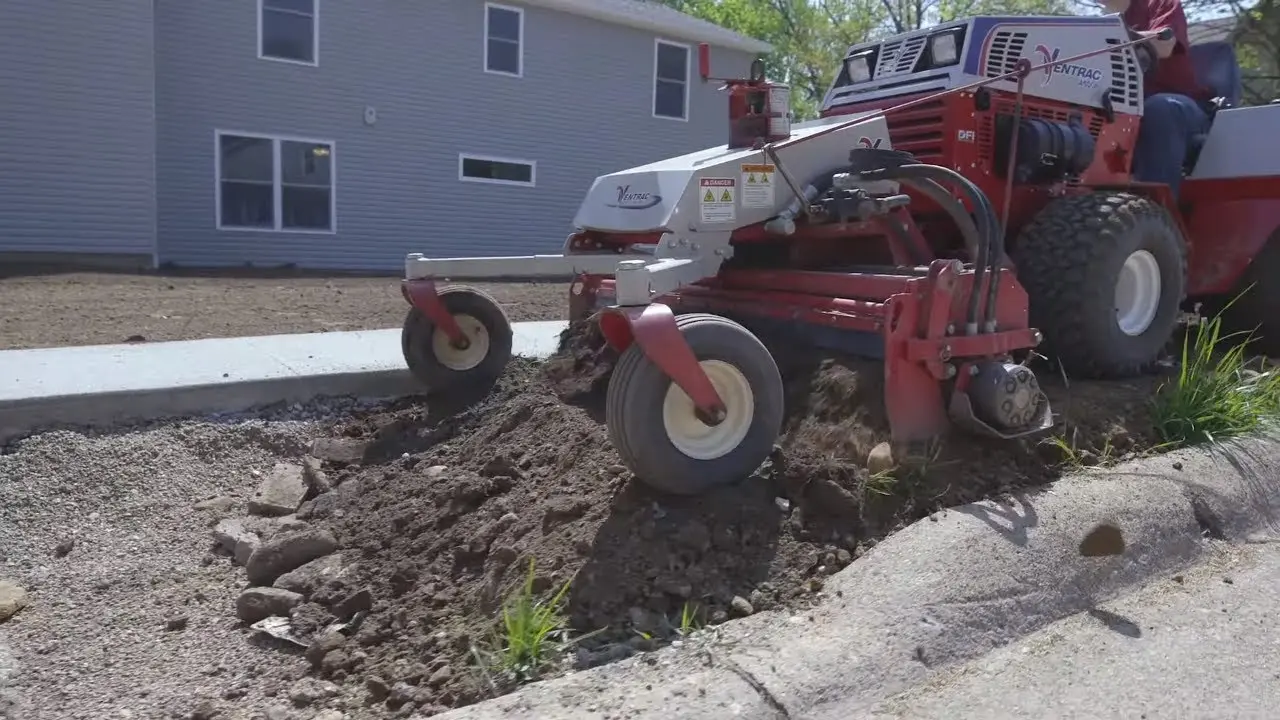 Installing a Lawn with One Tractor  Ventrac with Habitat For Humanity