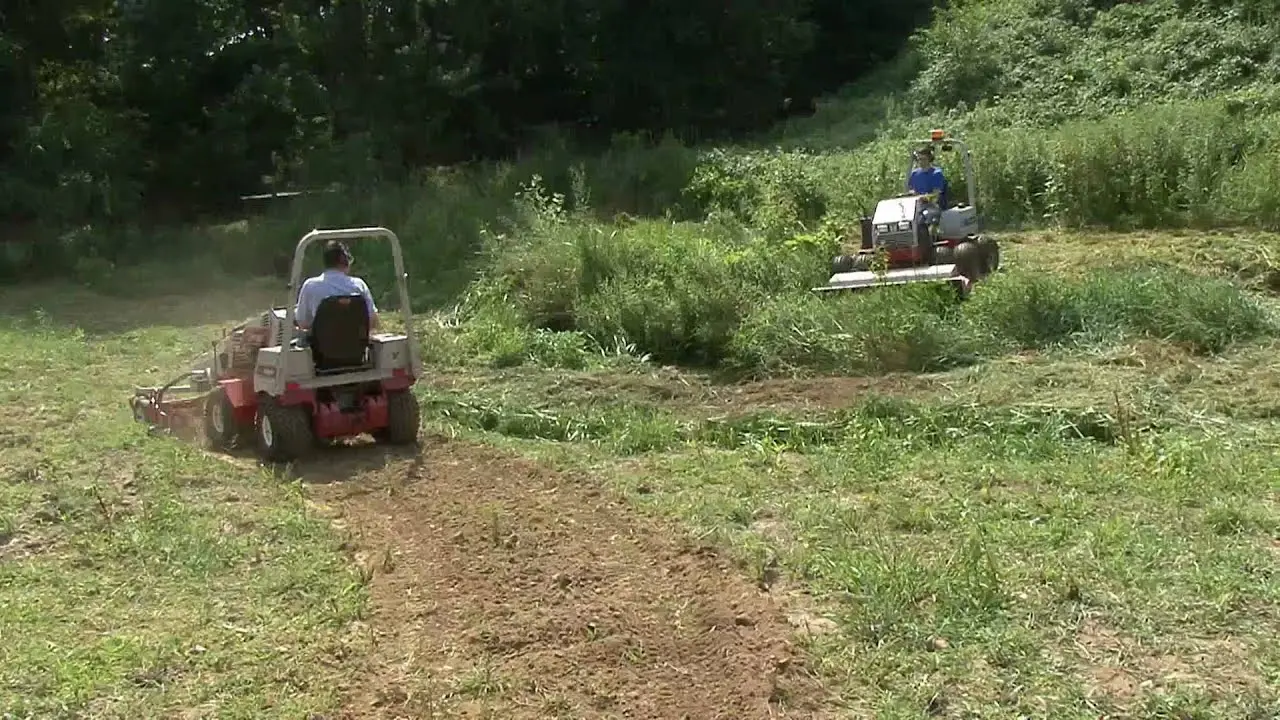 Ventrac destroys brush overgrowth on slope